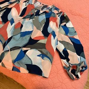New without tags.  Beautiful colorful blouse.